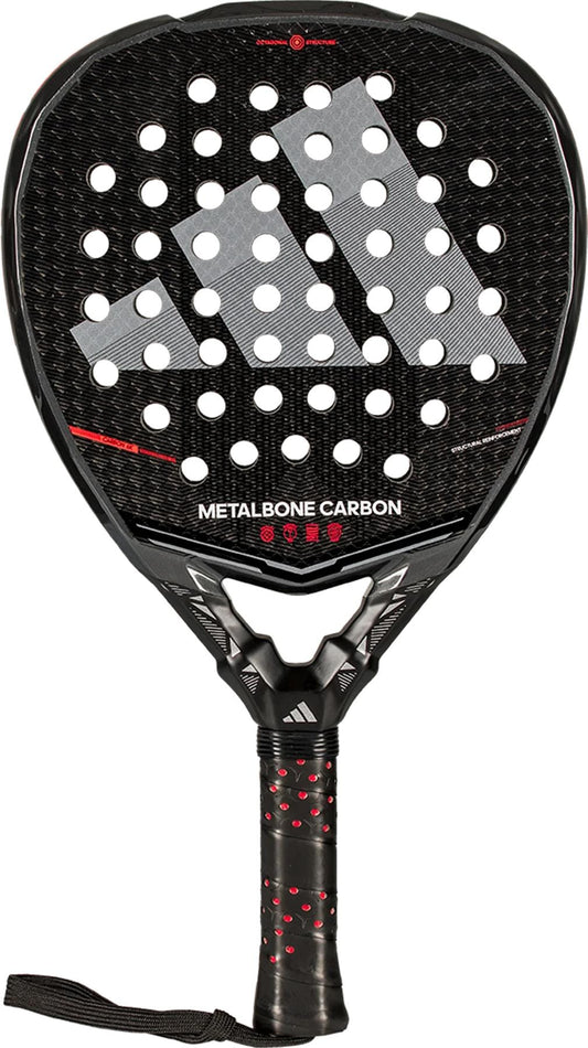 The adidas Metalbone Carbon 2026 Padel Racket features a black carbon fiber texture, large adidas logo, round holes, and "METALBONE CARBON" text. Designed for advanced players with a black grip handle accented in red.