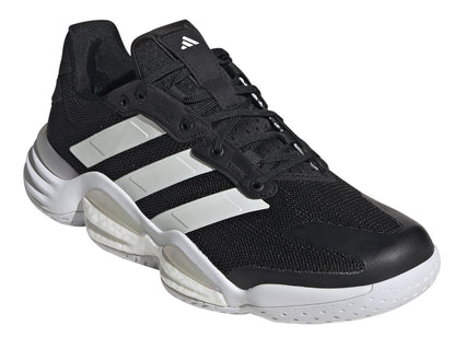 The adidas Stabil 16 Men's Padel Shoes in black feature a striking three-stripe design and textured sole for exceptional support, enhanced by a BOOST midsole for superior energy return.