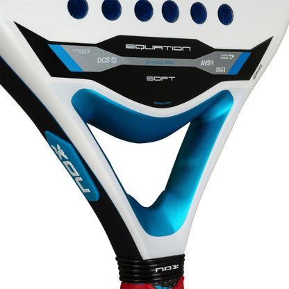 Close-up of the NOX Equation Soft Advanced 2026 Padel Racket by NOX, showing its white and blue design with "EQUATION," "SOFT," technical details, an anti-vibration frame system, and a partially visible grip at the bottom.