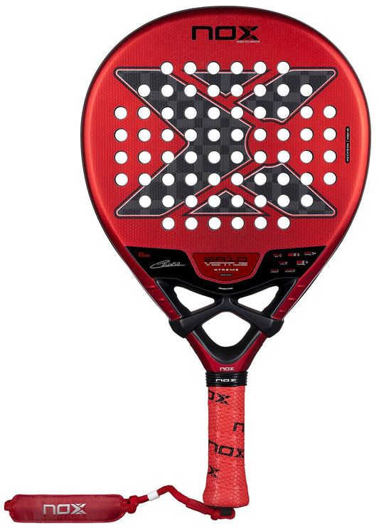 The NOX Luxury EA10 Ventus Hybrid 12K XTREM By Edu Alonso 2026 padel racket features a striking red design with a large black and white "X", carbon 12K surface, and includes a red grip and wrist strap attached to the handle.