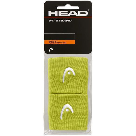 The HEAD 2.5" Padel Wristband in lime is packaged to emphasize its sweat absorption capabilities and prominently features the brand's logo. Crafted from a blend of nylon and elastane, this wristband offers comfort and durability for your game.