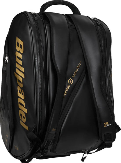 The Bullpadel BPP26006 Flow 2026 Padel Racket Bag in black with gold lettering features multiple zippered and thermal racket compartments plus padded shoulder straps, shown here on a white background.