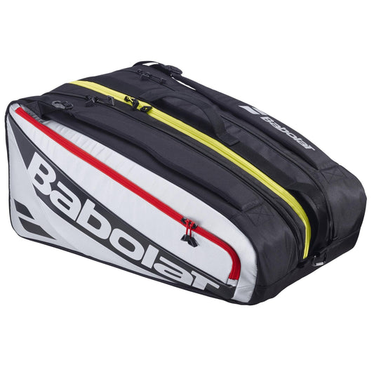 The Babolat RH Pro 4 Racket Padel Bag in black and silver has multiple compartments, including an insulated racket section, red and yellow zippers, and a prominent Babolat logo on the side.
