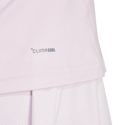 Close-up of fabric from the ADIDAS Womens Club Padel Tank Top - Pink, featuring "Climacool." Made with recycled materials, it showcases two layers with a perforated texture.