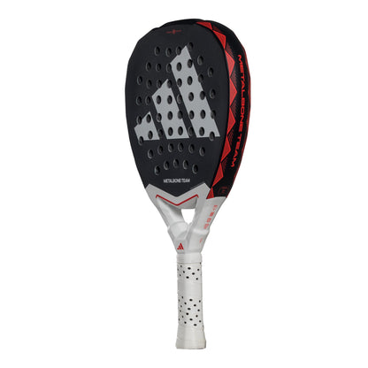 The adidas Metalbone Team 3.4 Padel Racket in Black/Red, perfect for advanced players, features a perforated surface for precision, a comfortable padded white grip, and the brand's logo prominently displayed on the face.