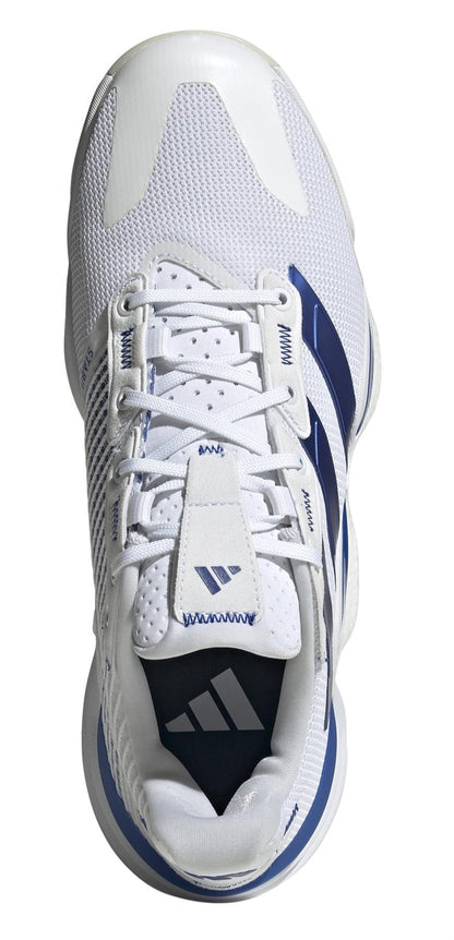 The ADIDAS Stabil 16 Men’s Padel Shoes feature a top view of white shoes with blue stripes and a mesh texture. They have white laces, and the tongue is adorned with adidas’ iconic three-stripe logo. With a BOOST midsole, they boast a sporty design perfect for sustainable shoe enthusiasts.