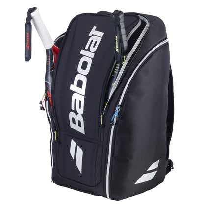 The Babolat RH Perf Padel 2nd Gen Backpack in black and silver features multiple zippered compartments, bold white logo accents, and keeps racquet handles separated for high-performance padel players.