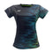 The Yonex YTL7 Women's Padel T-Shirt - Shadow is a tailored-fit, short-sleeve athletic top with a dark base and pixelated blue and green pattern. Made from moisture-wicking polyester, it features the Yonex logo on the upper left chest.