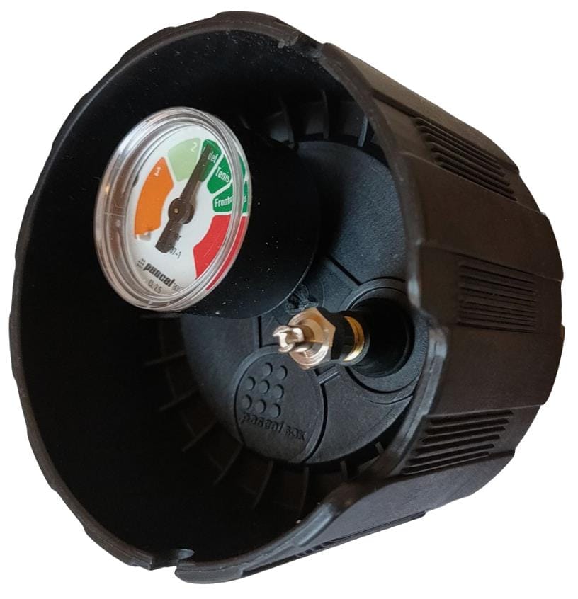 A close-up of a Bullpadel Pascal Padel Ball Pressuriser - 3 Ball Tube pressure gauge with a round dial featuring red, yellow, and green sections, plus a central metal nozzle.