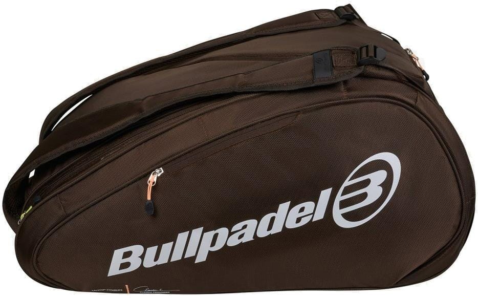 The Bullpadel BPP26024 Wonder 2026 Padel Racket Bag in chocolate features black straps, zippers, a white Bullpadel logo and "B" emblem, thermal racket compartments, and multiple sections, all set against a white background.