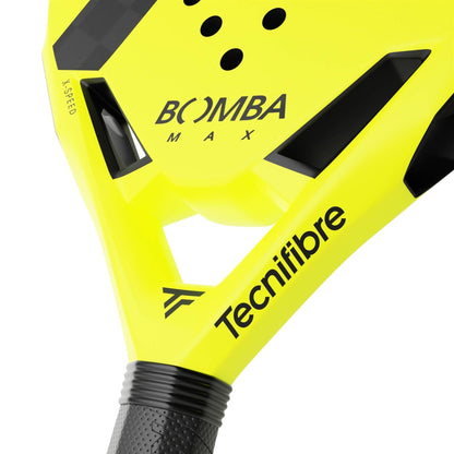 Close-up of the Tecnifibre Bomba Max Padel Racket in bright yellow with black accents, built for explosive power. The names "Bomba Max" and "Tecnifibre" are printed on its surface and frame.