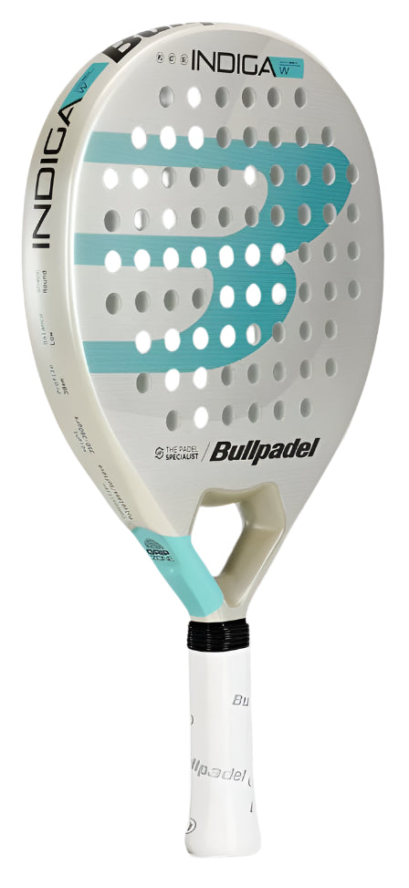 Introducing the ultralight Bullpadel Indiga W 2025 padel racket, boasting a sleek light gray and teal design. The face features a bold teal "B" logo with round holes, and the white handle displays "Bullpadel" in gray, combining style and performance flawlessly.