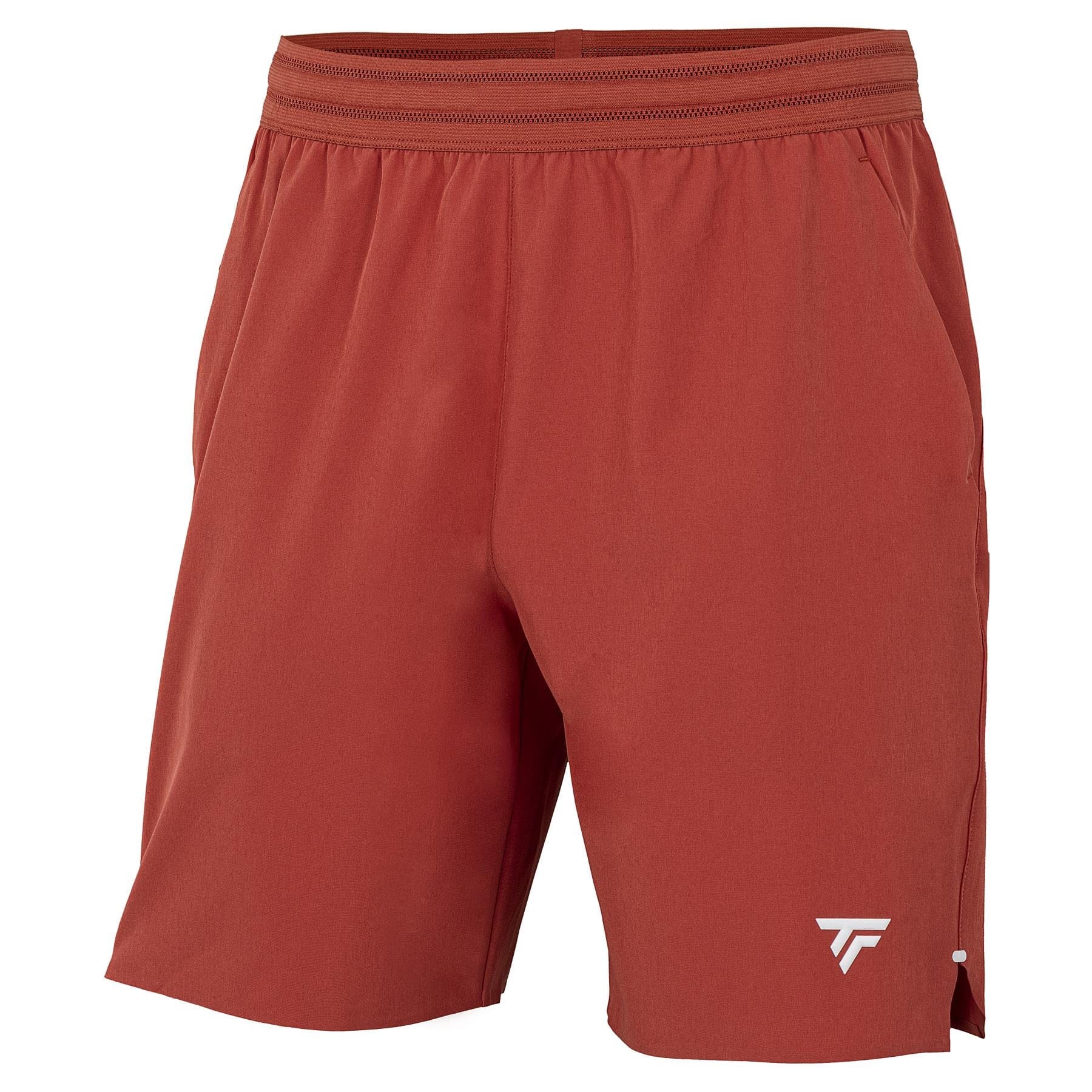 The Tecnifibre Team Stretch Men's Padel Shorts in Terracotta feature an elastic waistband, side pockets, a small white logo on the lower left leg, and a relaxed fit—ideal for comfortable movement on or off the court.