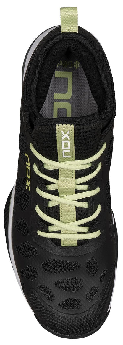 Top view of NOX Nerbo Men's Padel Shoes in black/soft lime with light green laces, matching pull tab, mesh upper, "NOX" branding, patterned sole featuring Abra X One tech, and an Ortholite insole for comfort.