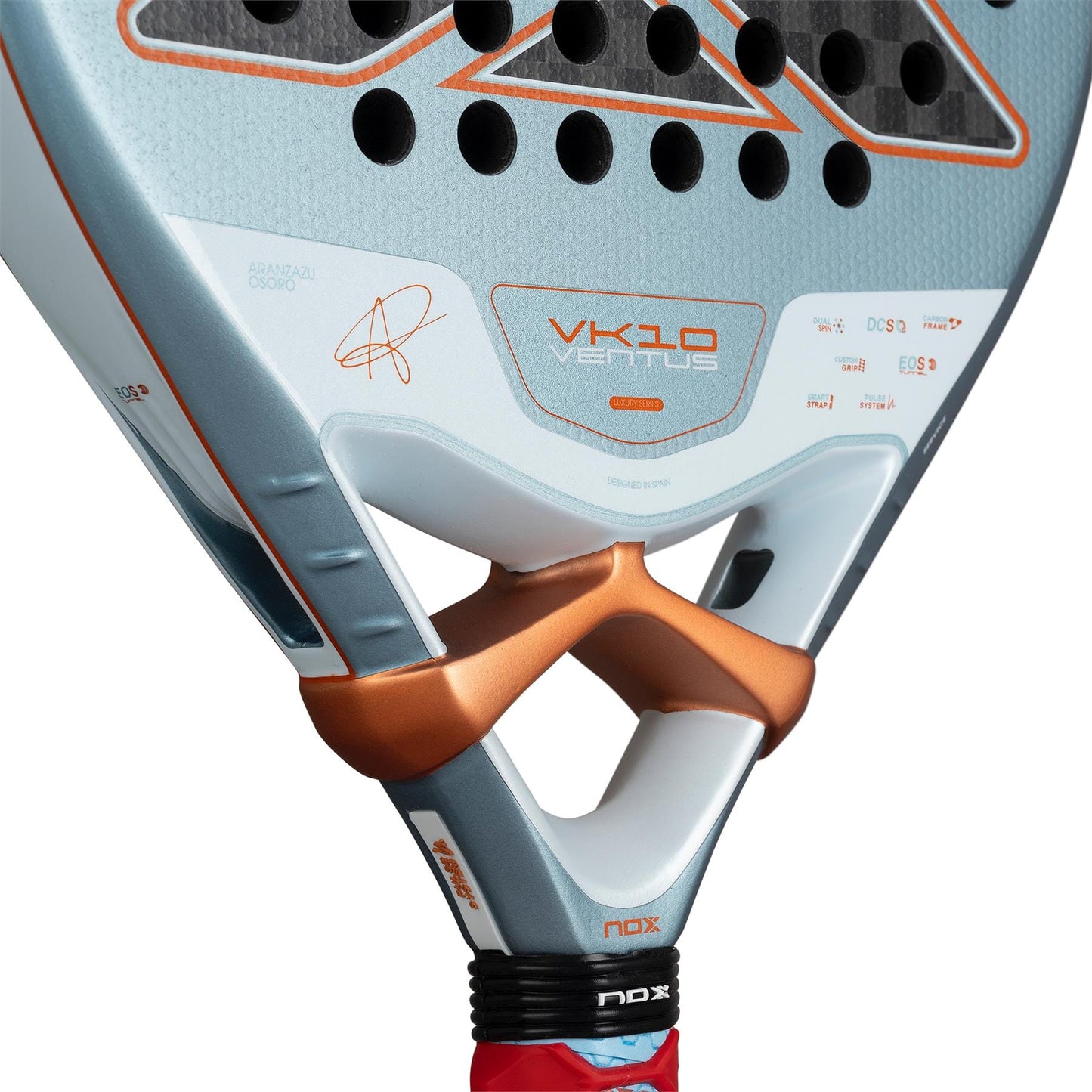 Close-up of the NOX Luxury VK10 Ventus Control 12K By Aranzazu Osoro 2026 Padel Racket, highlighting its geometric white, gray, and metallic copper design and “VK10 Ventus” branding on the 12K Carbon frame.