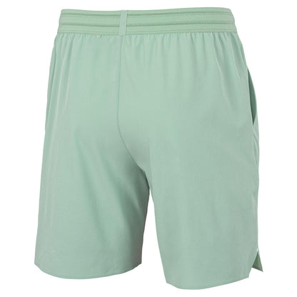 Tecnifibre Team Stretch Mens Padel Shorts in sage green are shown from the back, featuring an elastic waistband, subtle seam detail, and side pockets—ideal for on-court comfort.
