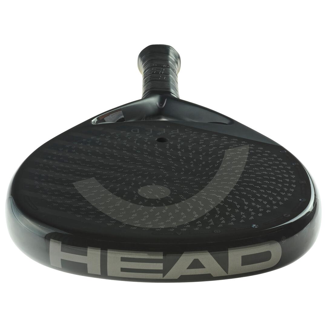 Close-up view of the HEAD Speed One X 2025 Padel Racket - Black, showcasing its textured surface and large "HEAD" branding. Equipped with Extreme Spin technology, it features a textured grip handle for superior control.