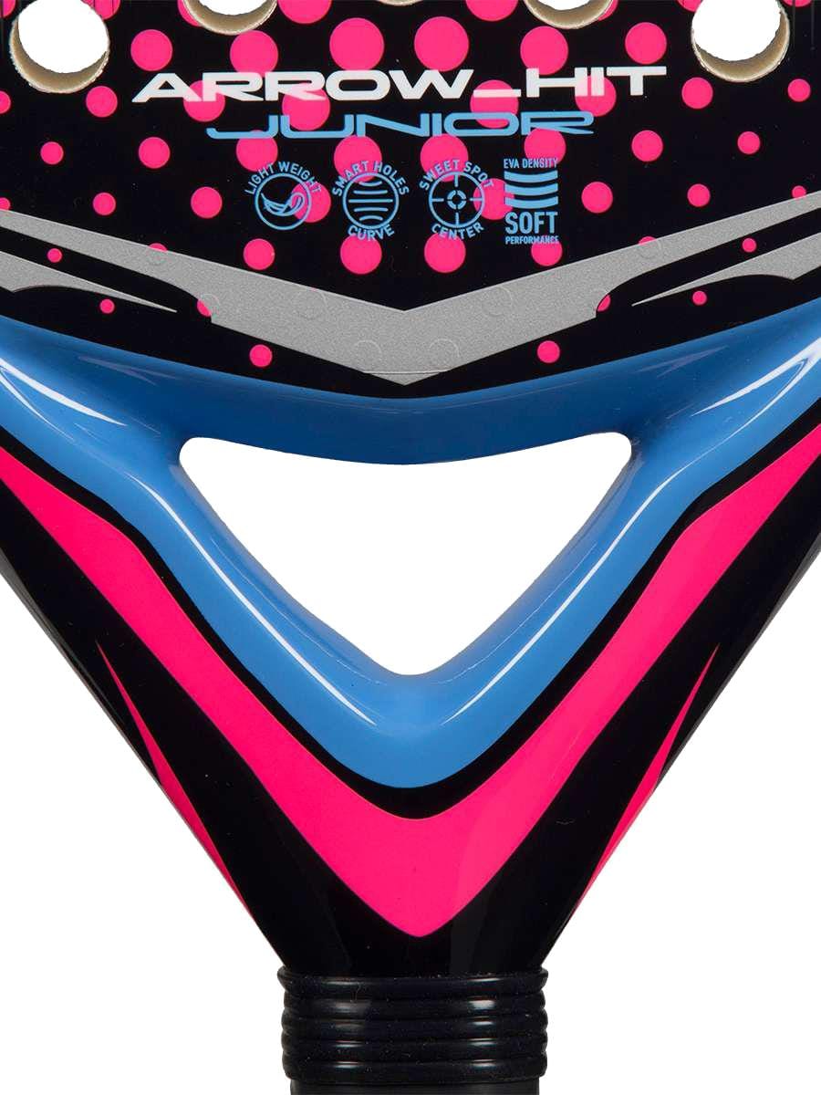 Close-up of the adidas Arrow Hit Junior White / Pink Padel Racket—a lightweight junior racket with stylish pink, blue, and black geometric patterns, open triangular throat, and "ARROWHIT JUNIOR" feature icons.