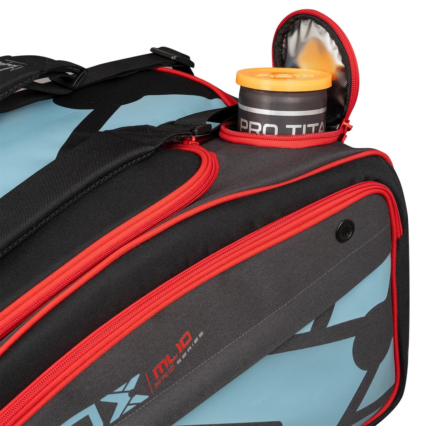 A close-up of the NOX ML10 Competition XL Compact Padel Racket Bag - Black / Red shows its black and red panels. A PRO TITAN can is partially visible in an open side pocket. Brand: NOX.