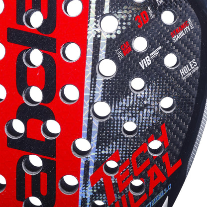 Close-up of the Babolat Technical Viper Soft 3.0 padel racket, showcasing round holes, branding, "TECHNICAL" and "DYNAMIC STABILITY SYSTEM" text, and a striking carbon twill texture.