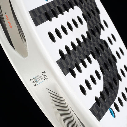 Close-up of the Bullpadel Vertex 05 2026 Padel Racket by Bullpadel in white/black, showing a large black "B", round perforations, markings such as "31," "6," "+POWER," and a small blue side label against a black background.