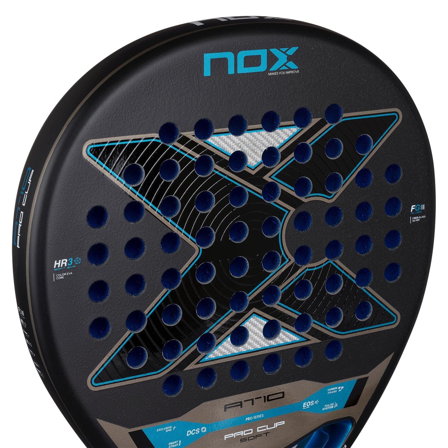 Close-up of the NOX AT10 Pro Cup Soft By Agustín Tapia 2026 Padel Racket, a black NOX racket with a blue "X" design, circular holes, and HR3 and Pro Cup Sport details on the edge. Inspired by Agustín Tapia.