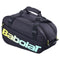 The Babolat Court S Padel Racket Bag - Black / Multi features sturdy handles, zipper closures, and bold "Babolat" branding in yellow-green and light blue—ideal for carrying your padel gear.