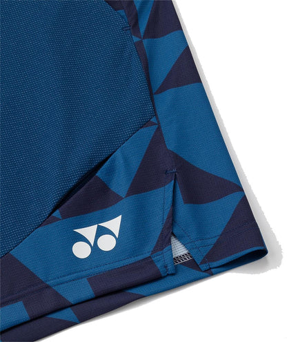 Close-up of a blue sports shirt's hem with a geometric pattern and white Yonex logo, matching Yonex 15240YX Knit Mens Padel Shorts - Indigo Blue by Yonex, made from breathable knit fabric for ultimate comfort.