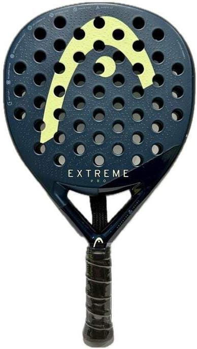 The HEAD Extreme Pro 2025 Mini Padel Racket Replica by HEAD features a black design, yellow logo, circular holes on the surface, and "EXTREME PRO" printed near the handle.