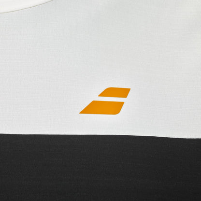 Close-up of the Babolat Crew Neck Mens Padel T-Shirt in black, crafted from technical fabric and featuring a small yellow geometric Babolat logo with two slanted rectangles stacked diagonally.