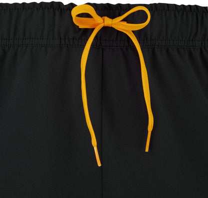 Close-up of the waistband of the Babolat Perf Men’s Padel Shorts in black, featuring a bright orange drawstring tied in a bow at the center.