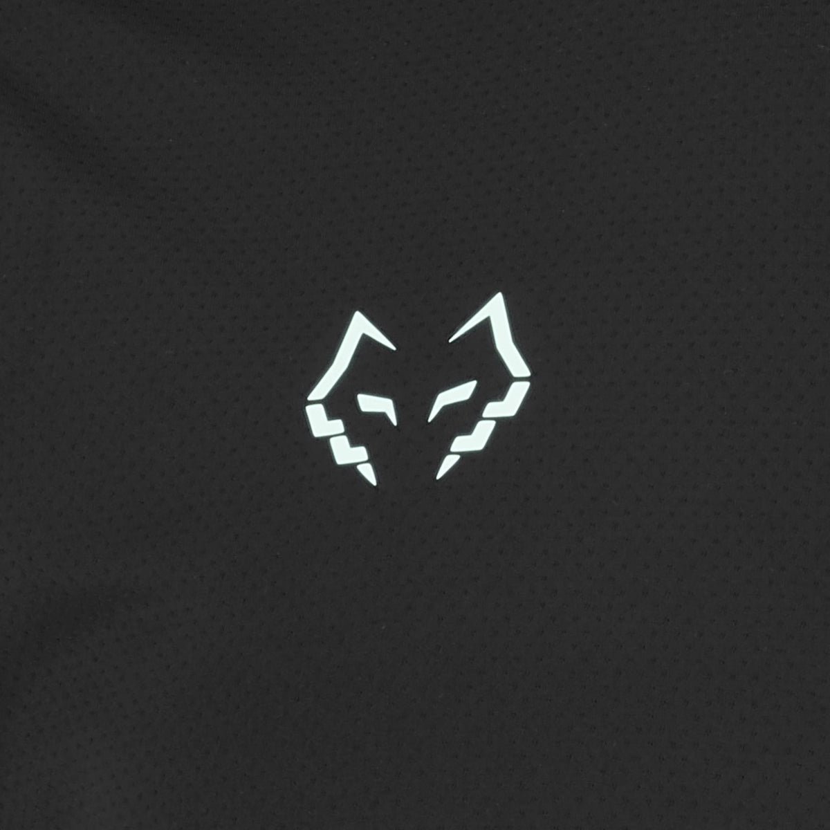 The Babolat Juan Lebron Crew Neck Mens Padel T-Shirt - Black features a white geometric fox head logo on a dark, textured background—ideal for sports or stylish padel matches.