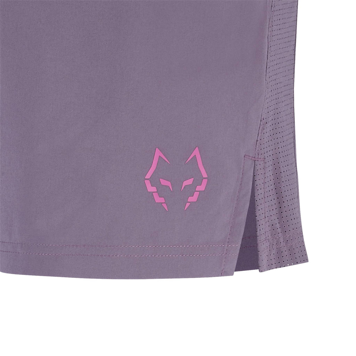 Close-up of the lower side of Babolat Juan Lebron Mens Padel Shorts - Black Plum showing a pink geometric wolf head logo, side slit with perforations, and lightweight stretch fabric.