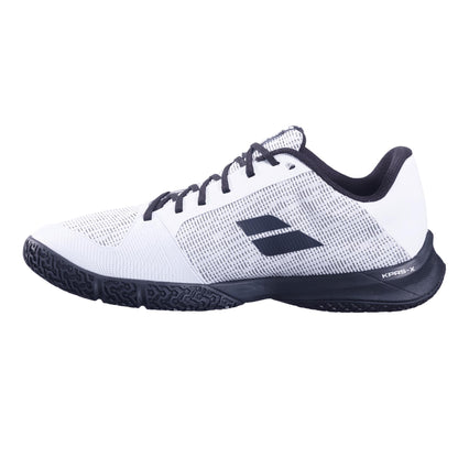 The Babolat Jet Viva Men's Padel Shoes in white and black feature a textured sole, black laces, and a stripe logo, making them ideal for intermediate players seeking sleek footwear for sports activities.