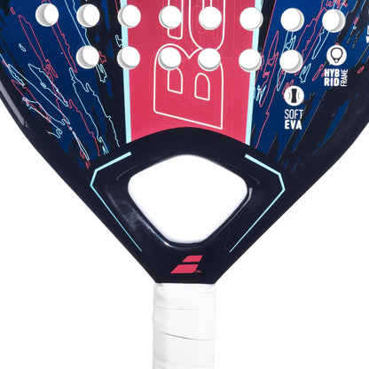 Close-up of the Babolat Contact Padel Racket - Black / Blue, ideal for beginner padel players looking for control. This racket showcases a geometric design with red, blue, and white accents. Its surface is adorned with circular holes and icons indicating "Soft EVA" and "Hybrid" specifications. The handle is wrapped in white grip tape.