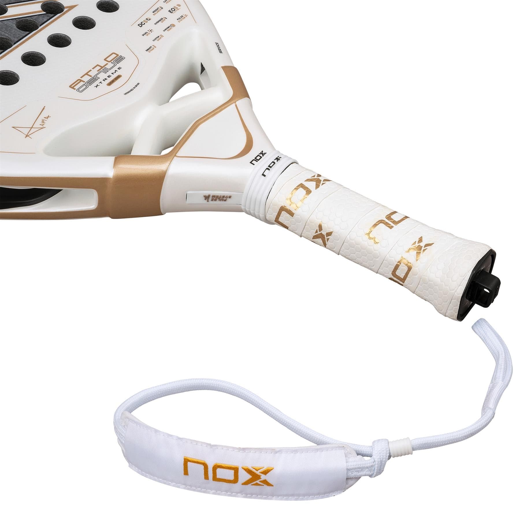 Close-up of the NOX AT10 Genius 12K Alum Extrem By Agustín Tapia 2026 padel racket handle in white and gold, with a white wrist strap and gold NOX logo, inspired by Agustín Tapia.