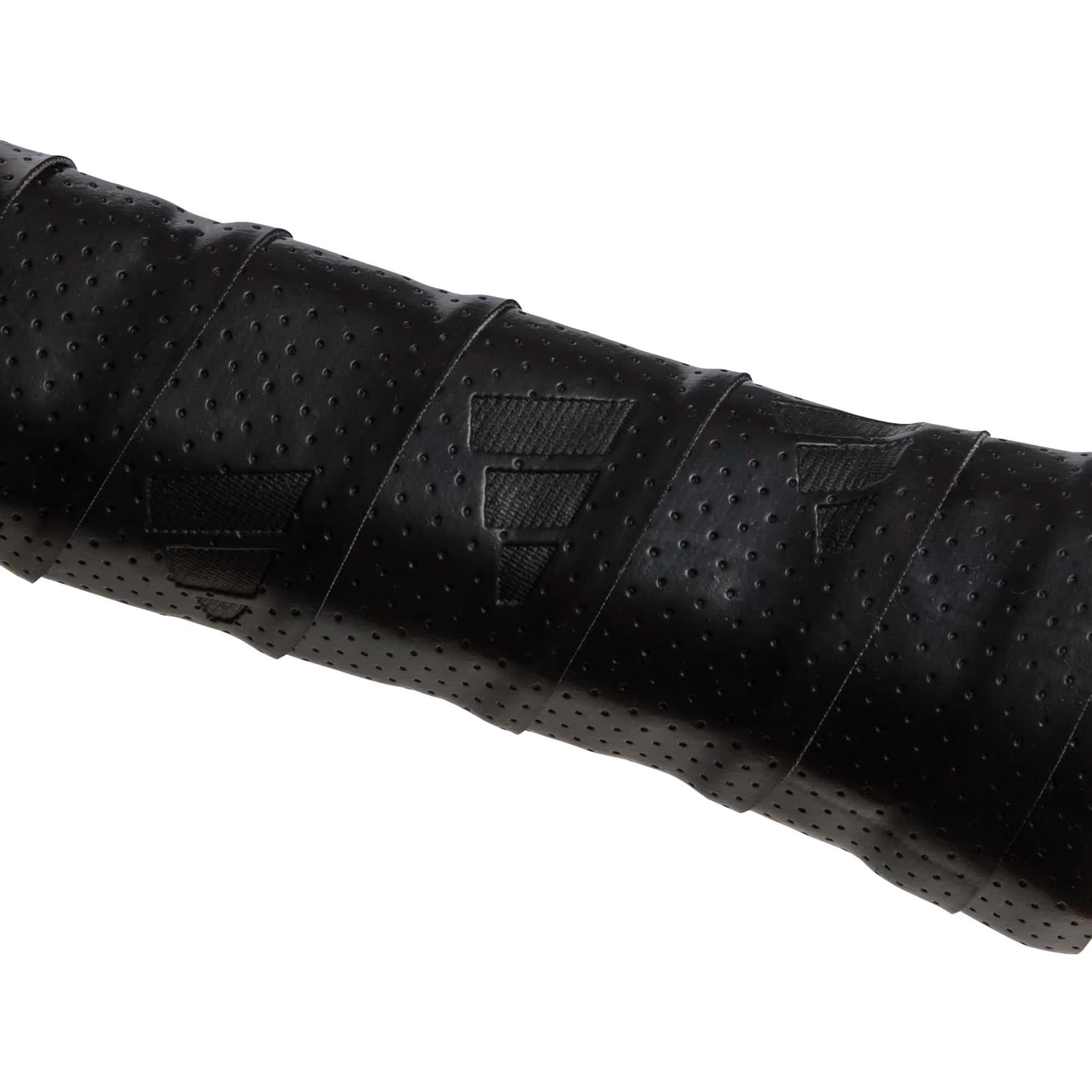 Close-up of adidas Padel Overgrips (3 Pack) in black, showing micro-perforations and embossed triangular patterns for superior comfort and grip on sports handles such as tennis rackets or bicycle handlebars.