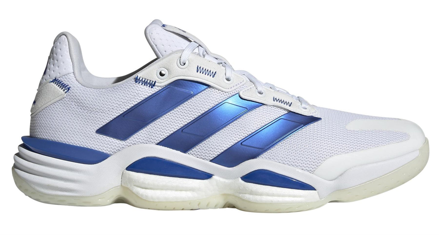 The adidas ADIDAS Stabil 16 Men's Padel Shoes in white/blue feature a textured mesh upper and thick BOOST midsole. Their sleek design offers sustainable style suitable for sports or casual wear.