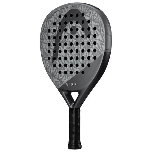 The HEAD Vibe 2025 Padel Racket in grey/black offers a textured fiberglass hitting surface with multiple holes, a striking logo on top, "VIBE" at the bottom, and a dark grip handle for enhanced control and comfort.