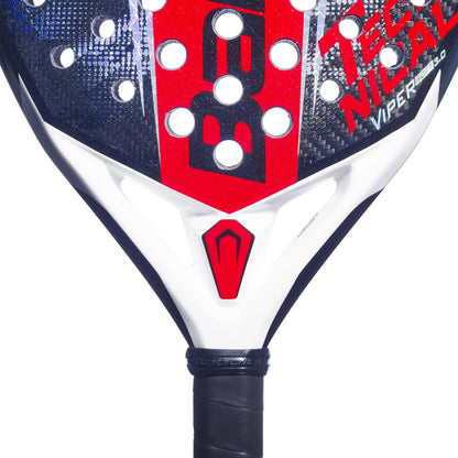 Close-up of the Babolat Technical Viper Soft 3.0 Padel Racket by Babolat in black, red, and white, showing "Viper," a unique logo above the handle, carbon twill texture, and multiple round holes on the surface.