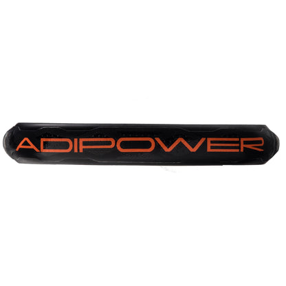 The ADIDAS Adipower CTRL 3.3 Padel Racket showcases a sleek black cylindrical design, with "ADIPOWER" highlighted in bold orange letters. Its elegant finish indicates a sturdy Carbon Fiber 3K construction from adidas, effortlessly blending style and durability.