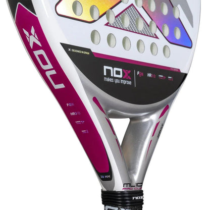 Close-up of the NOX ML10 Pro Cup Silver By Miguel Lamperti 2025 Padel Racket, featuring a white, pink, and silver design with brand and model details, racket face perforations, and its durable Carbon Structure.