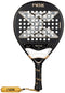 The NOX AT10 Genius 18K Alum By Agustín Tapia 2026 Padel Racket features a black design with gold and white accents, large X detail, circular holes, Dual Spin surface for control, plus a black handle with gold NOX logo and yellow wrist strap.