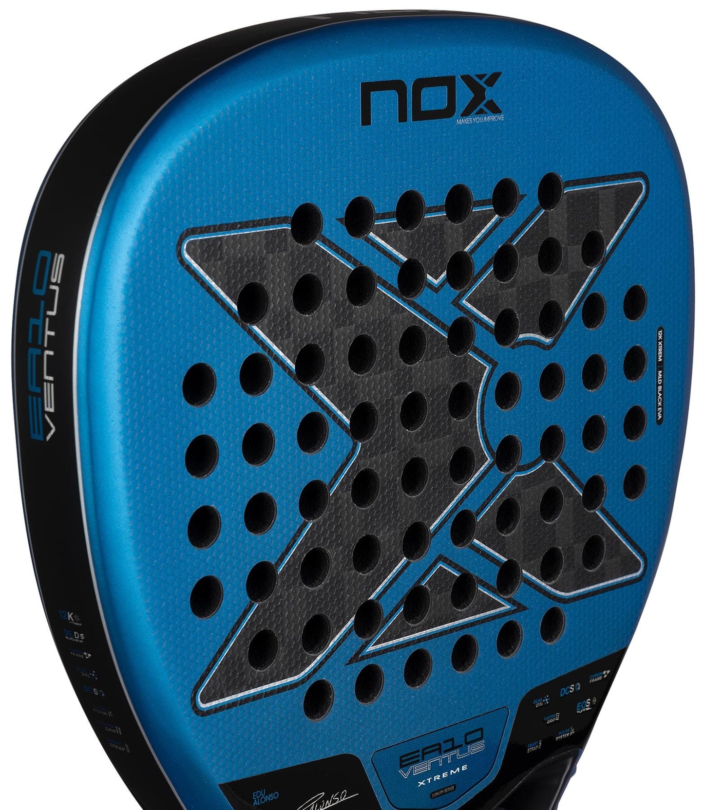 Close-up of the NOX Luxury EA10 Ventus Attack 12K XTREM By Edu Alonso 2026 padel racket, showing its blue and black "X" design, multiple holes, and "Nox" plus "Ealo Ventus" text on the 12K XTREM Carbon surface.