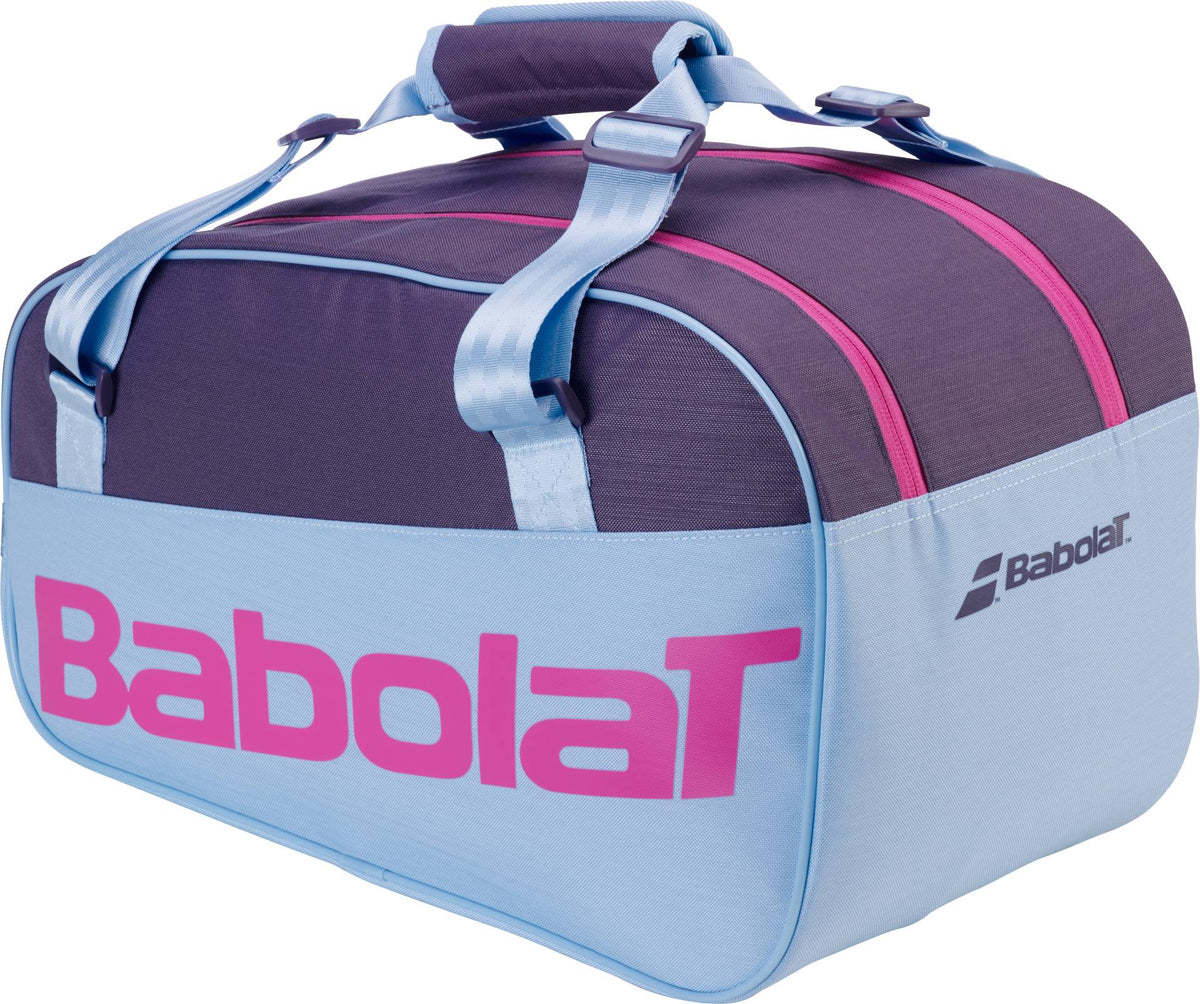 The Babolat Court S Juan Lebron Padel Racket Bag - Purple / Sky Blue features pink zippers, blue straps, a large pink “Babolat” logo, and is made from recycled polyester.