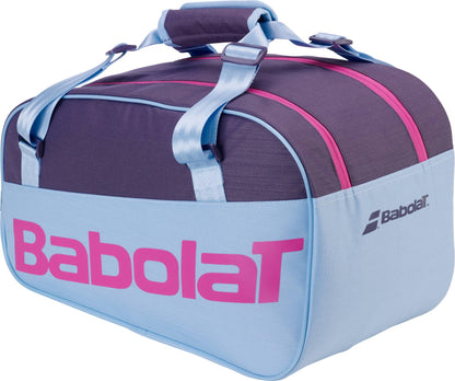 The Babolat Court S Juan Lebron Padel Racket Bag - Purple / Sky Blue features pink zippers, blue straps, a large pink “Babolat” logo, and is made from recycled polyester.