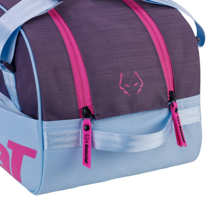 A close-up of the Babolat Court S Juan Lebron Padel Racket Bag - Purple / Sky Blue, featuring pink zippers and “Babolat” and “SFX Babolat” on the zipper pulls, made from recycled polyester.