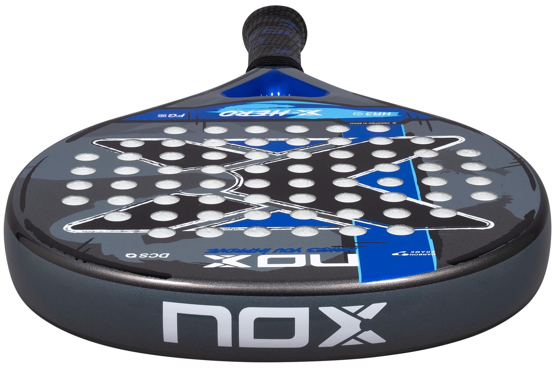 Close-up of the NOX X-Hero Blue Padel Racket by NOX, featuring a stylish black and blue design with a bold center "X," white holes, and grip-wrapped handle—perfect for beginners seeking control and precision.