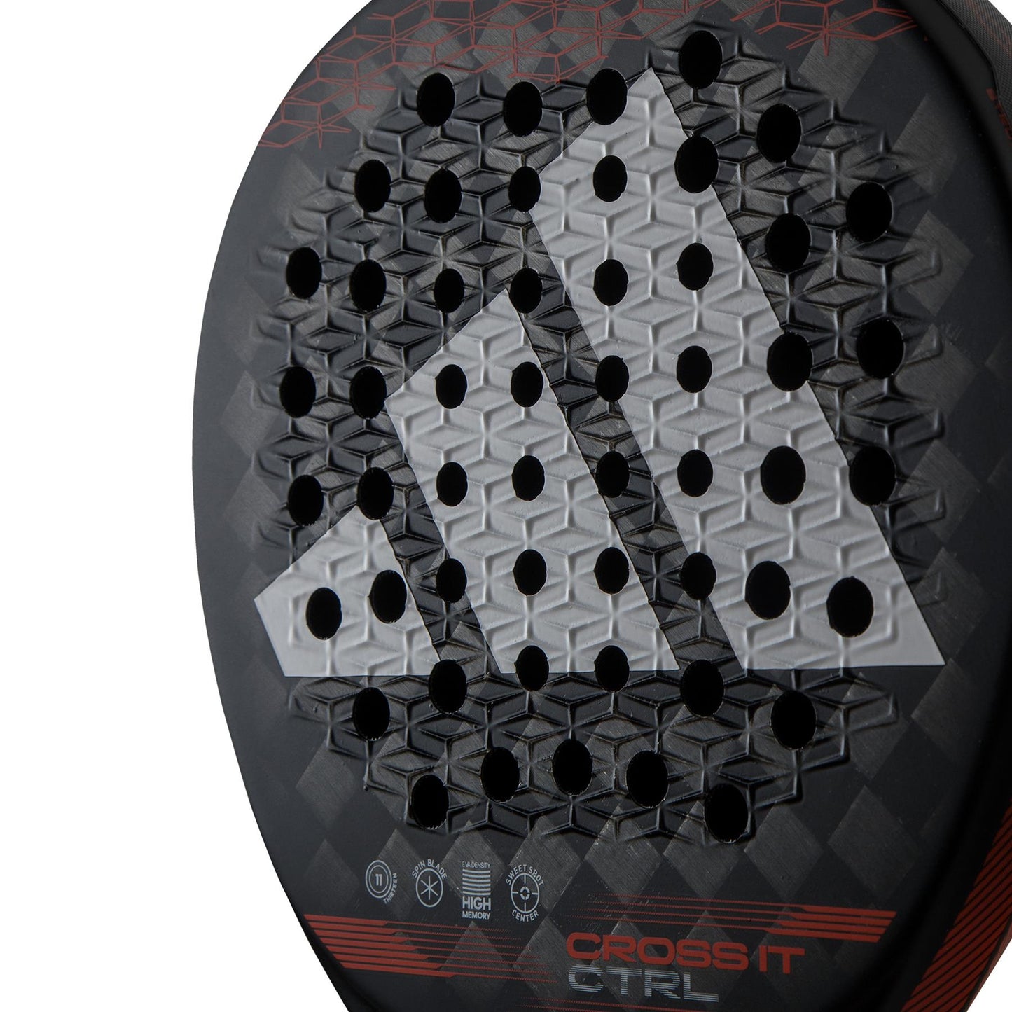 A close-up of the adidas Cross It CTRL Padel Racket in black and red reveals its geometric pattern and strategically placed holes. The surface showcases a textured design, highlighted by a large triangular symbol for enhanced control and spin, with "Crossit CTRL" prominently displayed at the center.