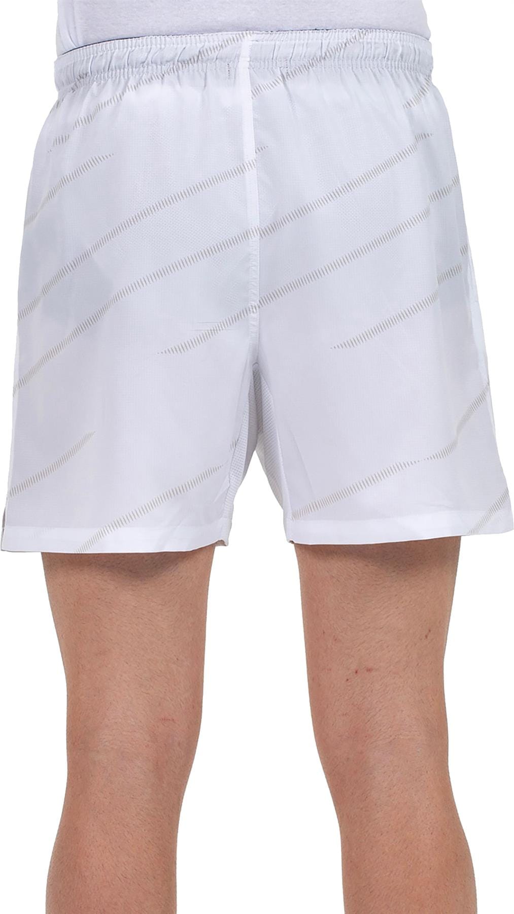 A person wearing Bullpadel Cabanas Mens Padel Shorts - White, shown from waist to above the knees. The image highlights the fit and features Bullpadel's Quickerdry technology for comfort during play.